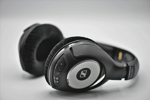 Black headphones against white backgrounds. Learn how to properly clean your headphones and other electronics.