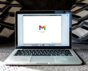 A Macbook loading Gmail on Safari